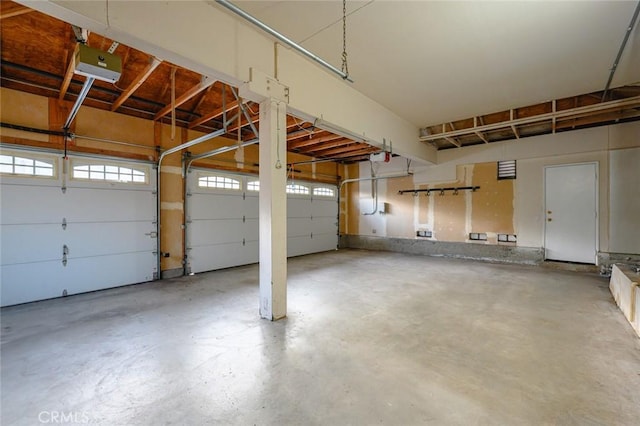 garage featuring a garage door opener