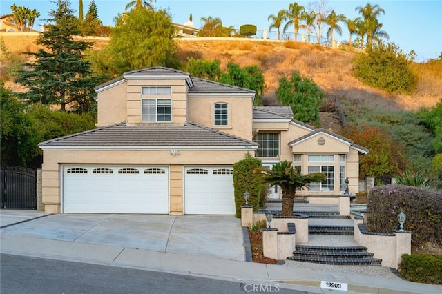 view of front of property with a garage