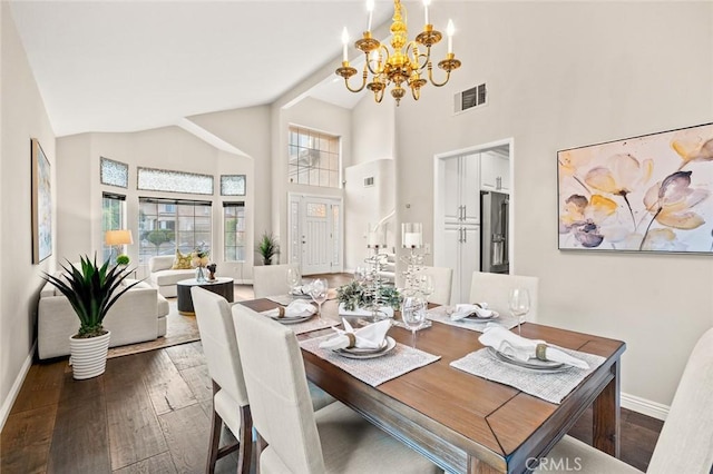 dining space with high vaulted ceiling, a notable chandelier, and dark hardwood / wood-style flooring