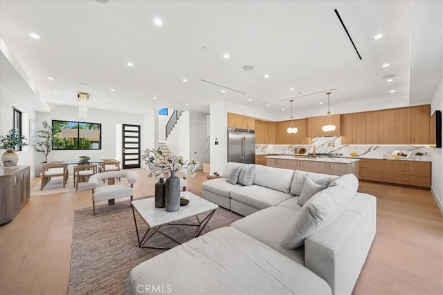 living room with light hardwood / wood-style floors