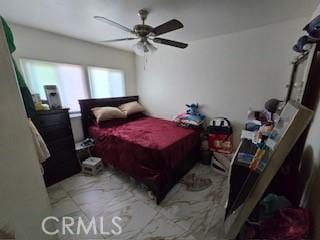 bedroom featuring ceiling fan