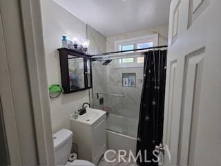 full bathroom featuring vanity, shower / bath combination with curtain, and toilet