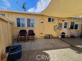 rear view of house featuring a patio area