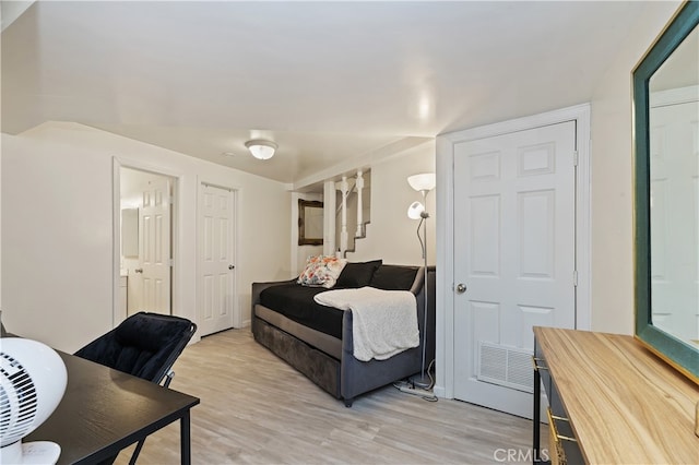 bedroom featuring light hardwood / wood-style flooring