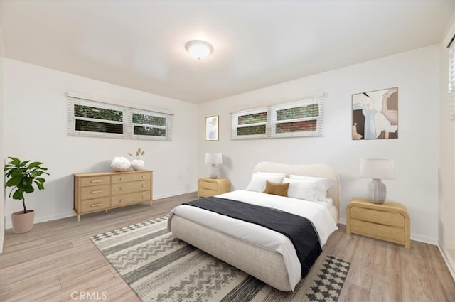 bedroom featuring light hardwood / wood-style floors