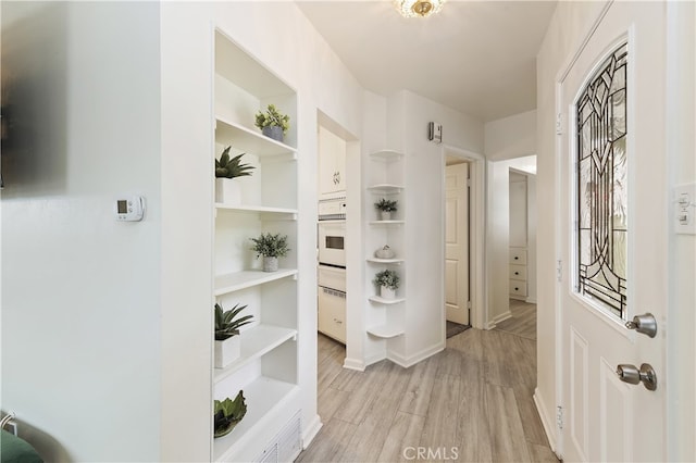 interior space with light hardwood / wood-style flooring