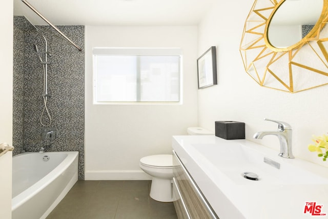 full bathroom with vanity, tile patterned flooring, tiled shower / bath combo, and toilet