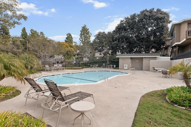 view of pool featuring a patio