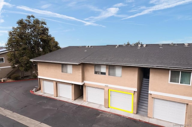 view of building exterior with a garage