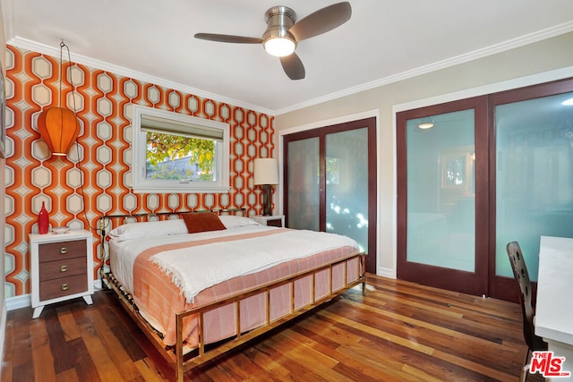 bedroom with ornamental molding, dark wood-type flooring, and ceiling fan