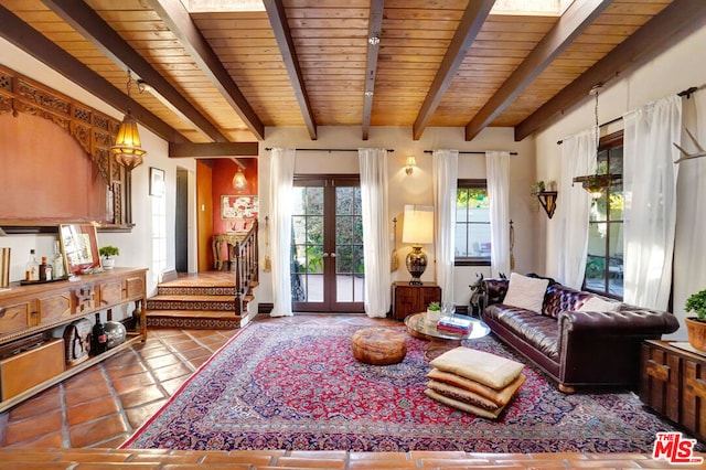 living room featuring french doors, tile patterned floors, wood ceiling, a skylight, and beam ceiling