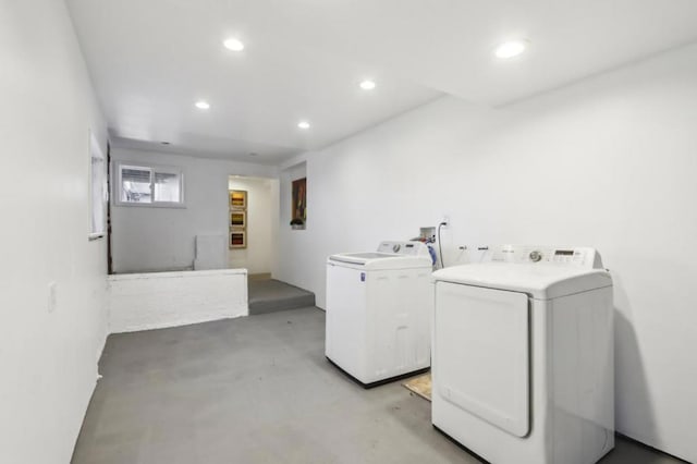 clothes washing area featuring washing machine and dryer