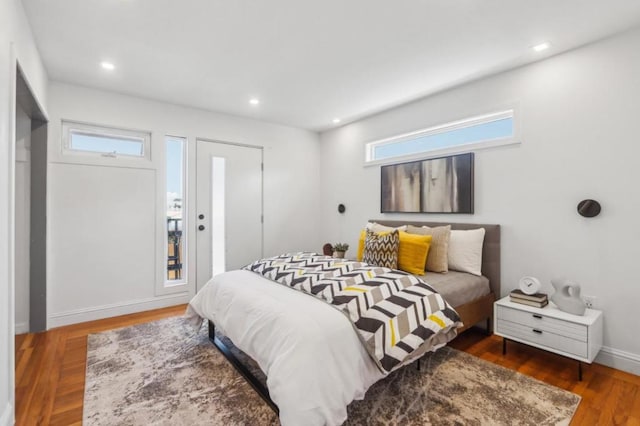 bedroom featuring dark hardwood / wood-style floors