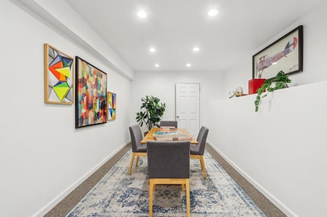 view of carpeted dining space