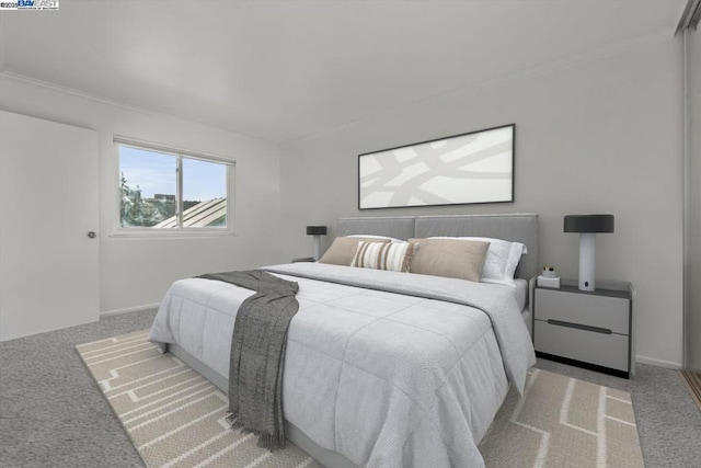 bedroom featuring light carpet