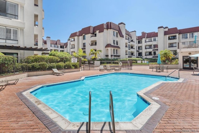 view of pool featuring a patio