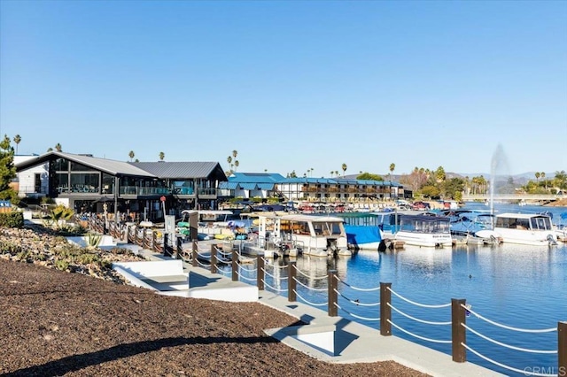 dock area featuring a water view