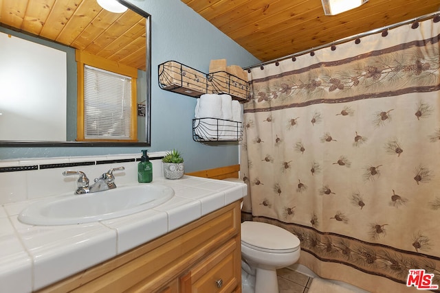 bathroom featuring vanity, wooden ceiling, tile patterned floors, and toilet