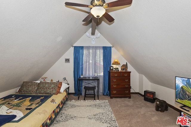 carpeted bedroom with lofted ceiling and ceiling fan