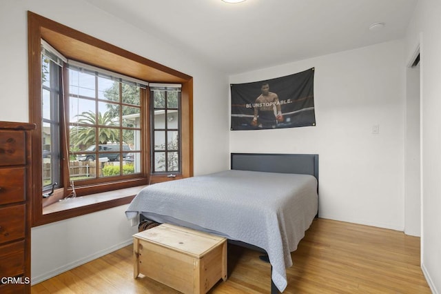 bedroom featuring hardwood / wood-style flooring