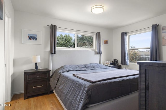 bedroom with light hardwood / wood-style floors