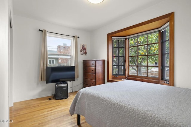 bedroom featuring hardwood / wood-style floors