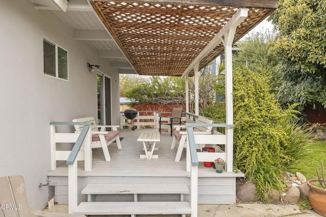 deck featuring a pergola