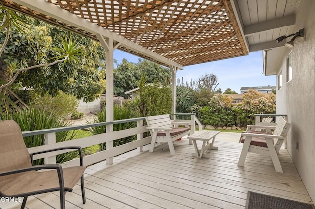 wooden deck with a pergola