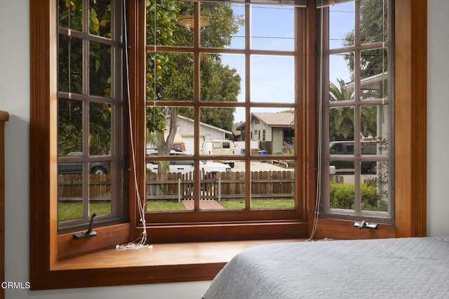 bedroom featuring multiple windows