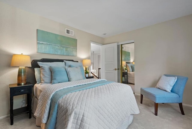 carpeted bedroom with a closet