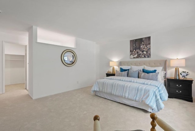 bedroom featuring light colored carpet