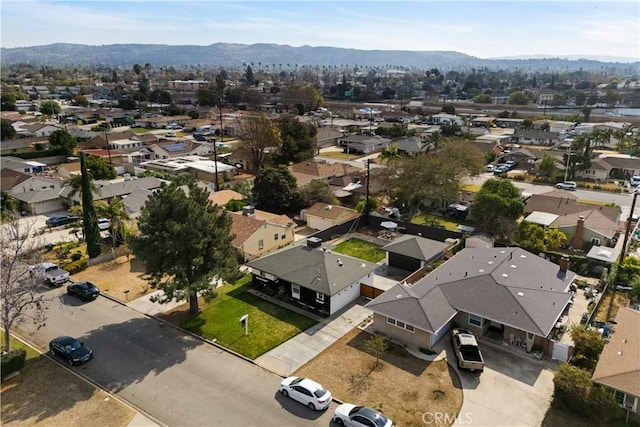 drone / aerial view featuring a mountain view