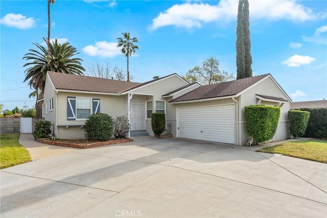 single story home featuring a garage