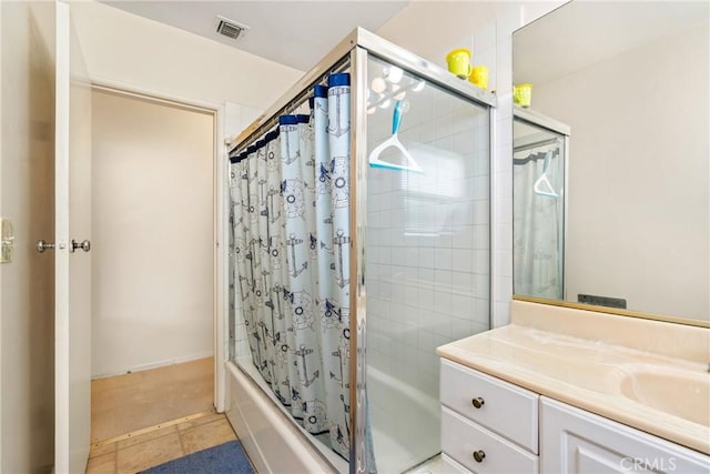 bathroom featuring vanity and shower / bath combination with curtain