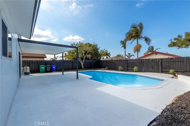 view of swimming pool featuring a patio