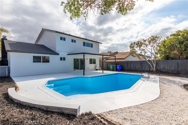 view of swimming pool featuring central AC and a patio area