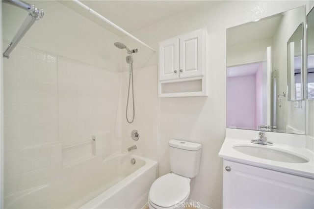 full bathroom featuring vanity, toilet, and  shower combination