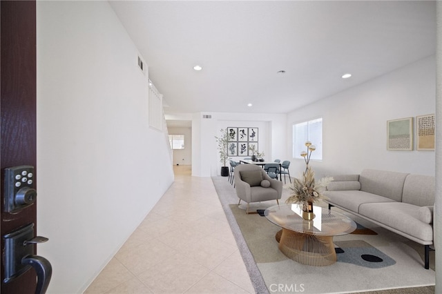 living room with light tile patterned floors