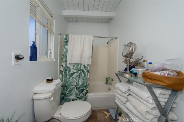 bathroom with toilet, beam ceiling, and shower / bath combo