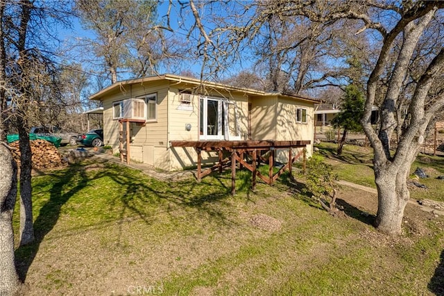 exterior space with a front yard