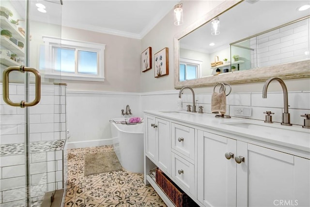 bathroom featuring crown molding, tile patterned floors, plenty of natural light, and a shower with door