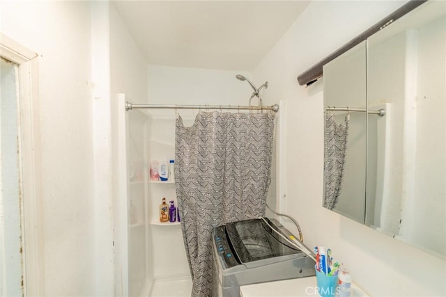 bathroom featuring curtained shower