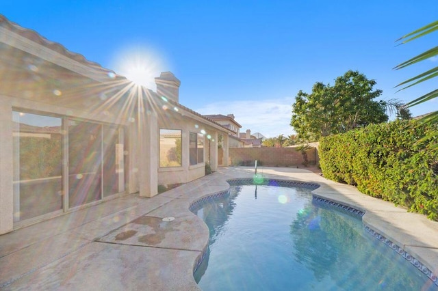 view of pool featuring a patio area