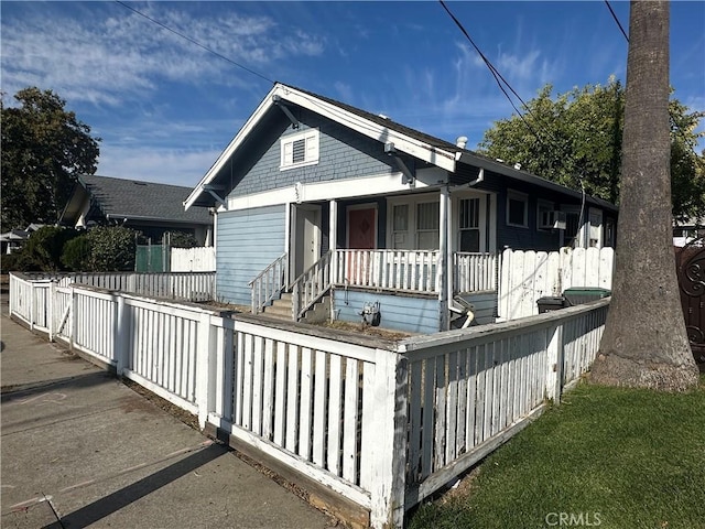 bungalow-style home featuring a porch