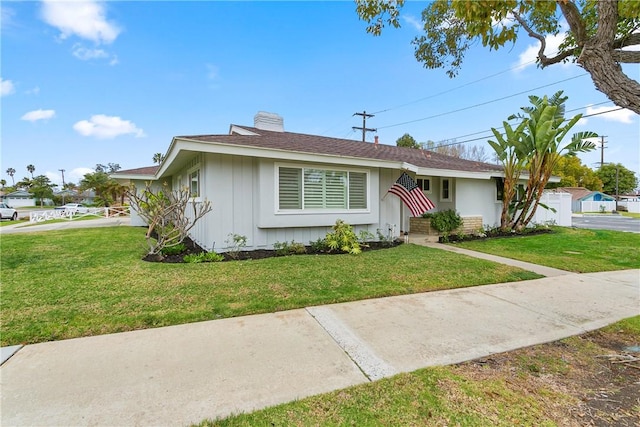 ranch-style house with a front yard