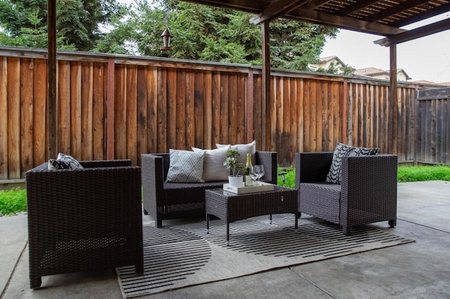 view of patio / terrace with an outdoor living space and a pergola