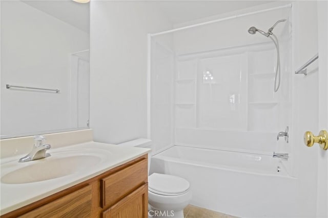 full bathroom featuring vanity, tile patterned floors, shower / washtub combination, and toilet