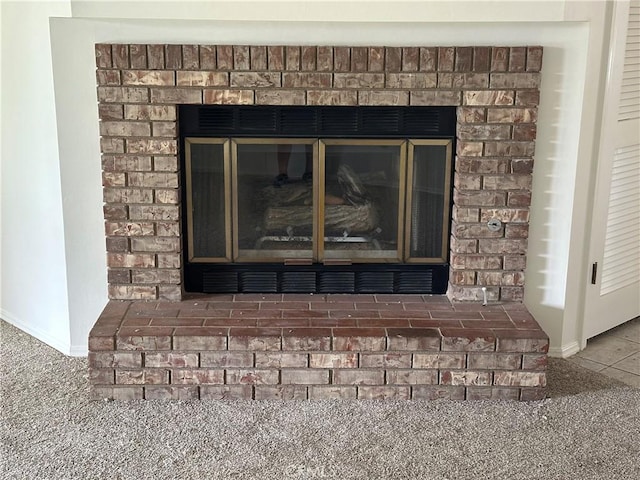 details featuring carpet floors and baseboards