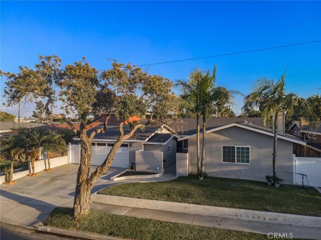3140 Sumatra Pl, Costa Mesa, CA 92626 - view of front of home featuring driveway, a garage, and stucco siding