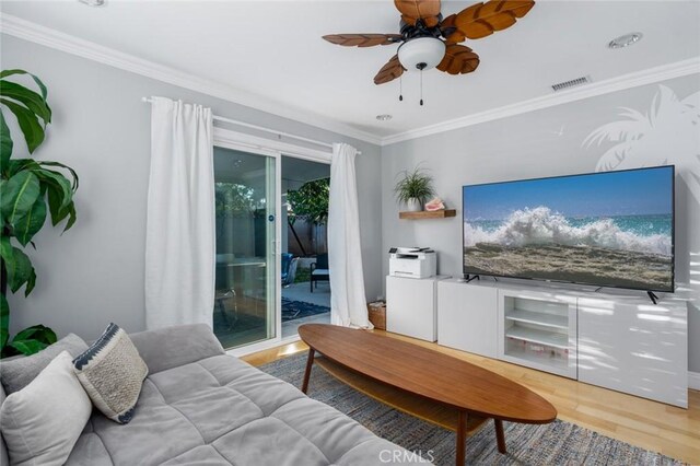 3140 Sumatra Pl, Costa Mesa, CA 92626 - living area with wood finished floors, a ceiling fan, and ornamental molding